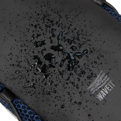 Close-up view of the WAVEIT crossbody bag in black with water droplets on the surface, showcasing the bag's water-resistant material.