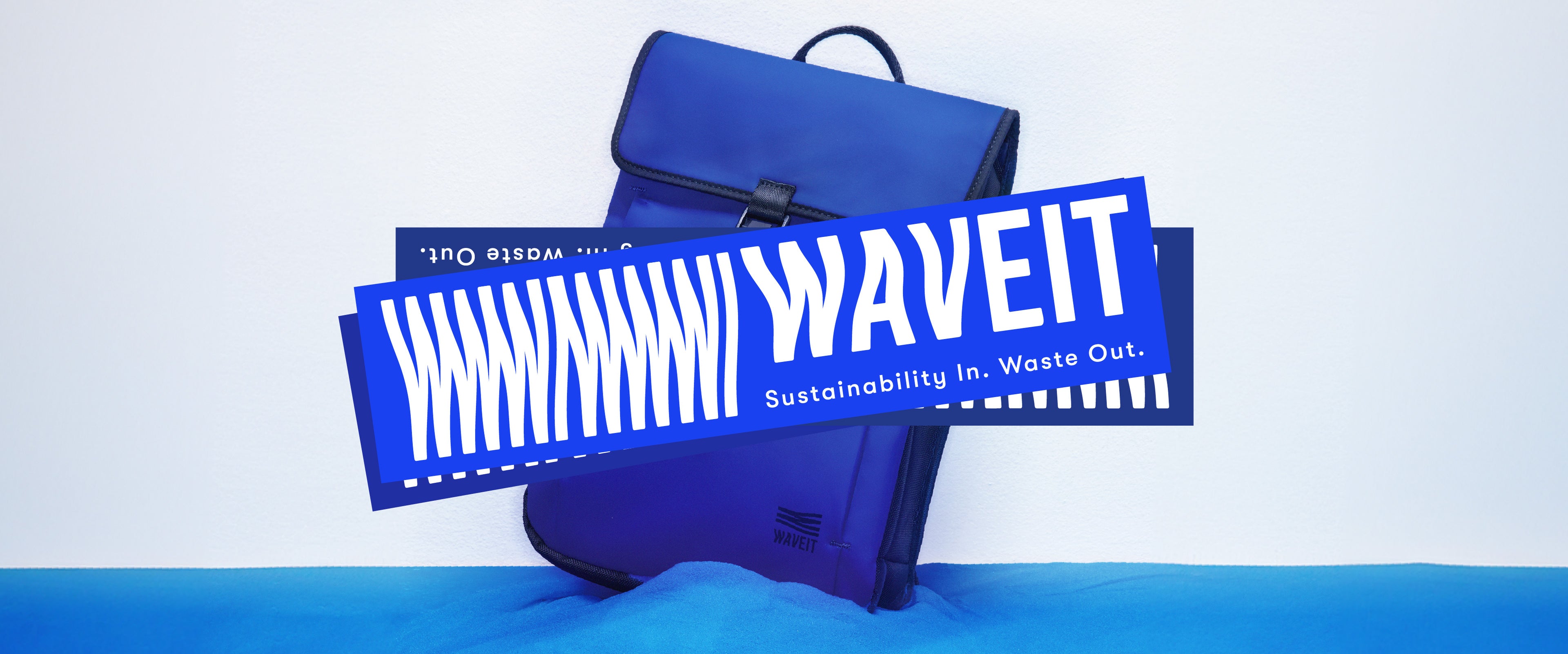 WAVEIT campaign banner featuring a blue backpack with the text ‘WAVEIT: Sustainability In. Waste Out.’ in bold white and blue lettering.